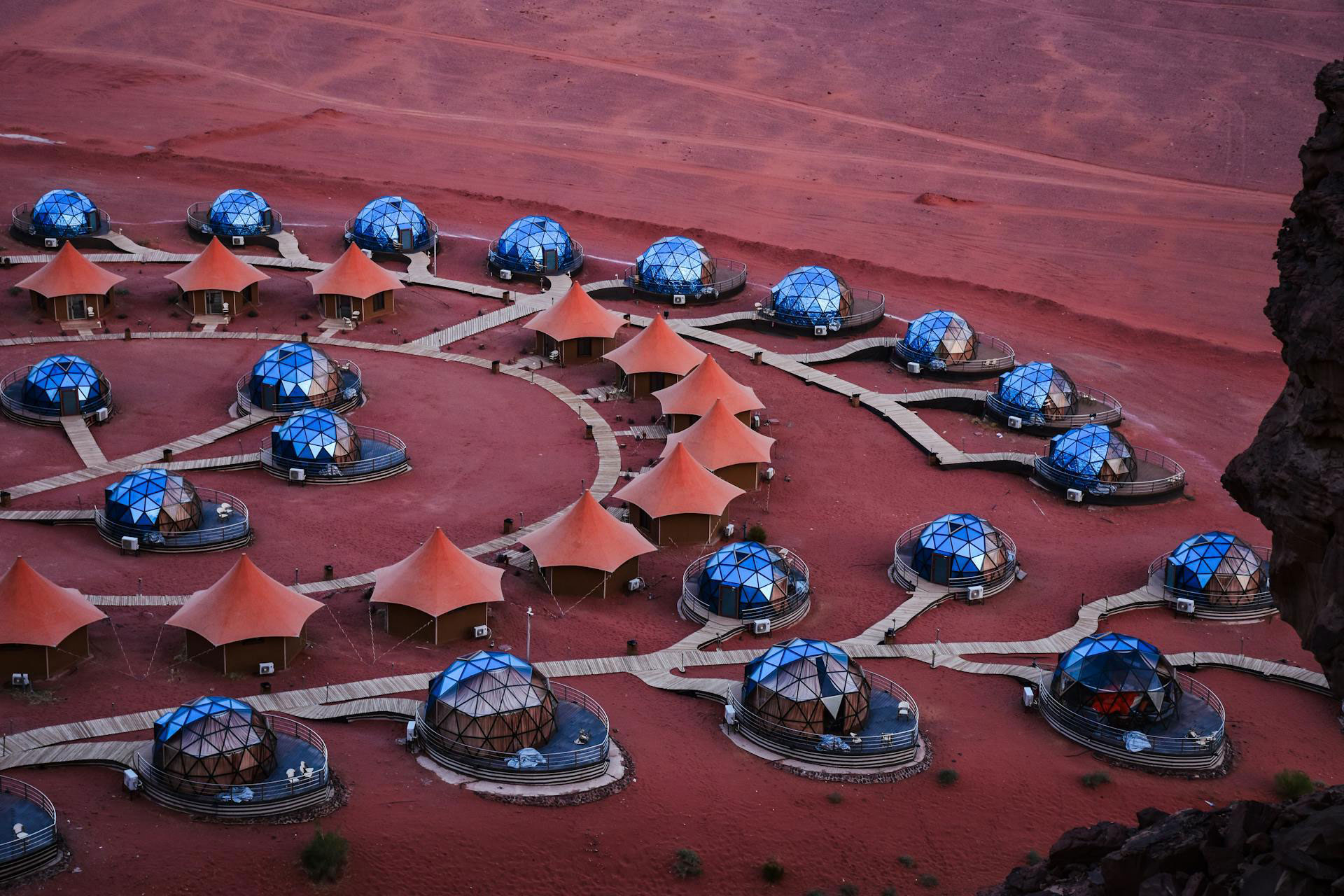 Aerial view of luxury bubble dome camp in Wadi Rum desert, Jordan.