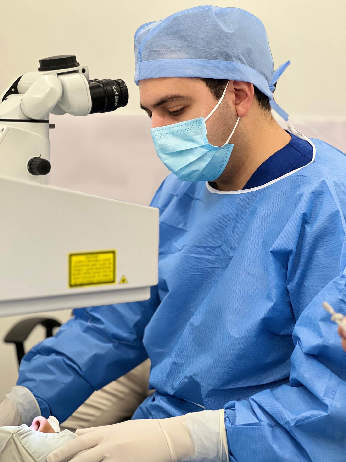 Eye surgeon performing PRK laser eye surgery with excimer laser technology in Jordan.