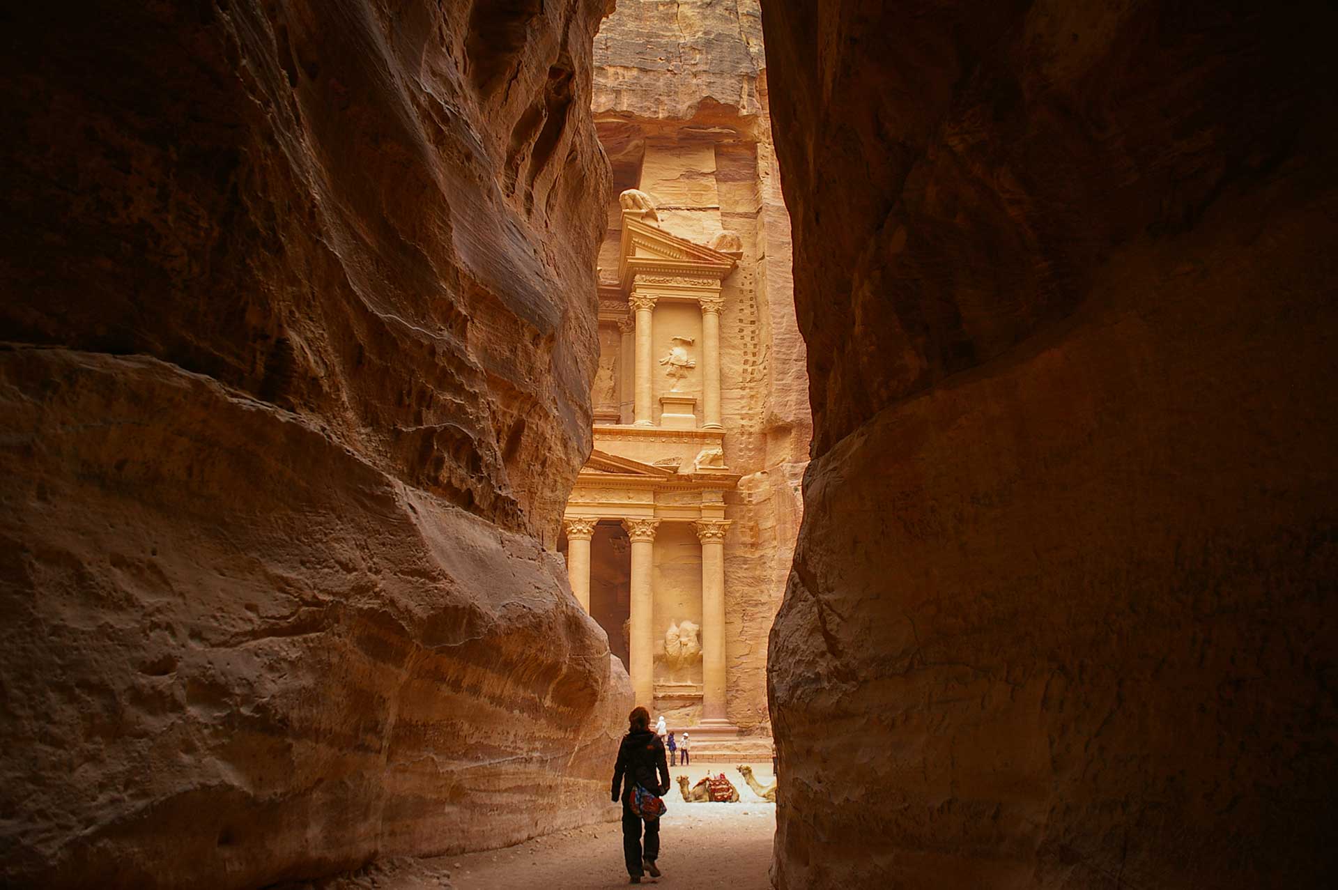 The Treasury (Al-Khazneh) in Petra, Jordan, viewed through the Siq canyon entrance.